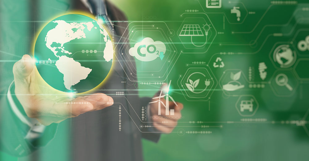 Hand holding a digital globe surrounded by eco-themed technology icons, symbolizing the balance between innovation and environmental sustainability.