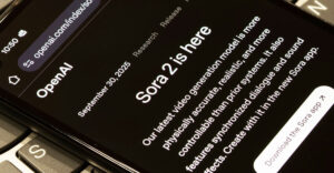 Smartphone screen displaying OpenAI’s Sora 2 launch page, highlighting the release announcement of the AI video generator