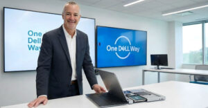 Jeff Clarke in front of One Dell Way signage