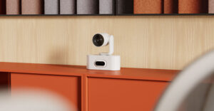 Logitech Rally AI Camera Pro in a modern conference room