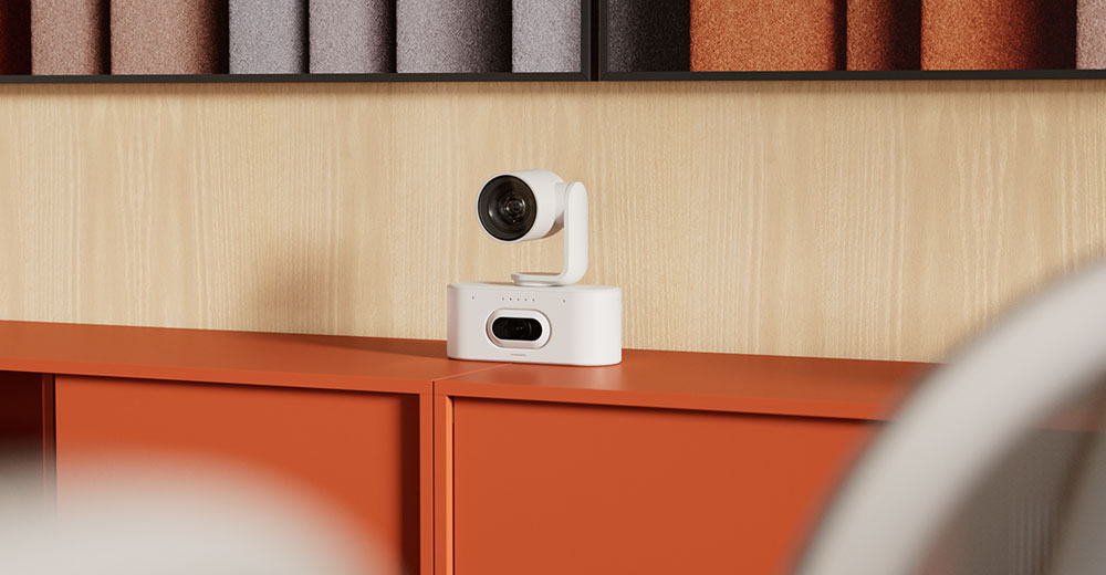 Logitech Rally AI Camera Pro in a modern conference room