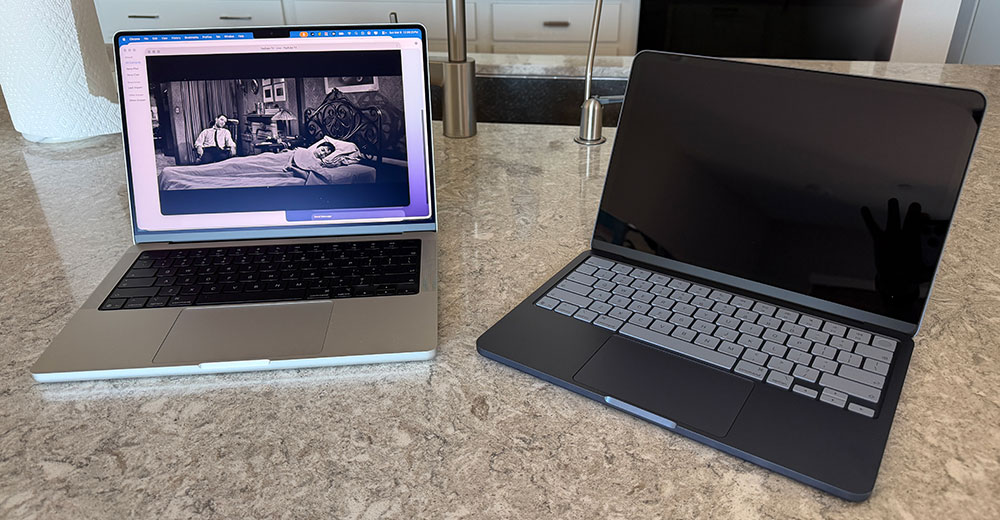MacBook Pro M5 and MacBook Neo laptops shown side by side illustrating Apple’s expanding Mac lineup.