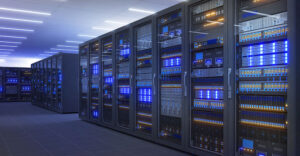 Rows of high-density server racks in a modern data center with visible power and cooling systems supporting AI workloads