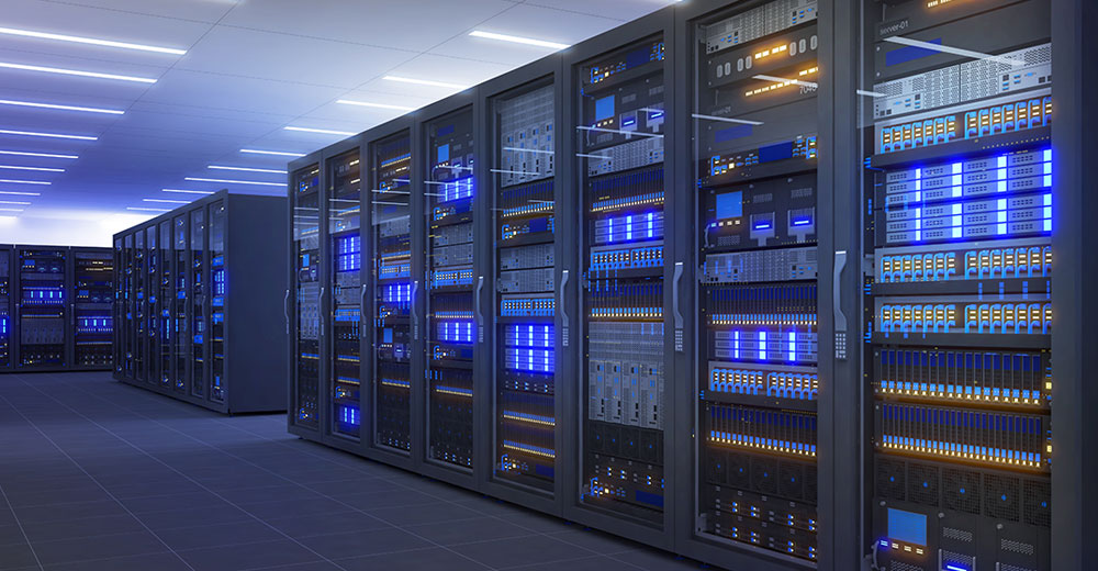 Rows of high-density server racks in a modern data center with visible power and cooling systems supporting AI workloads
